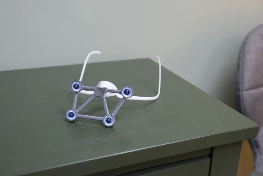 The lightweight tracking frame worn during TPS treatment
